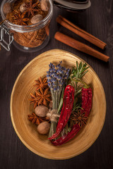 Spices: star anise, rosemary, chilli pepper, nutmeg and cinnamon