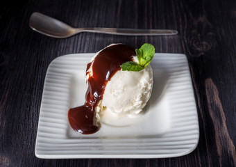 Vanilla ice cream with chocolate syrup