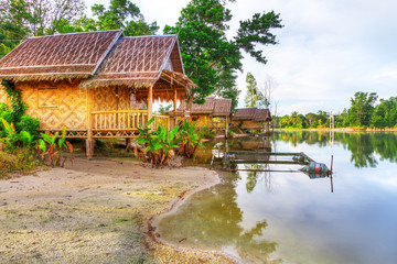 Small wooden houses at the jungle in Thailand