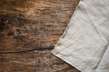 Tablecloth on wooden table background