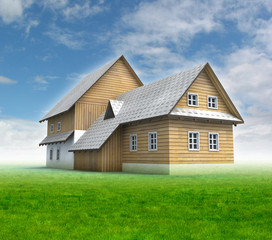 Obraz premium Classical mountain cottage with green grass and blue sky