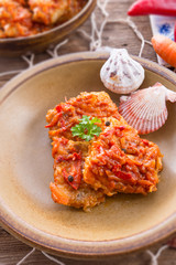 fish in Greek kind with vegetables and tomato sauce