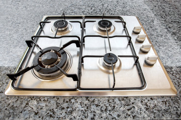 Burners on the gas stove in the kitchen