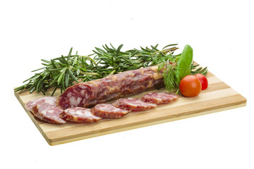 Salami with rosemary, basil and tomato