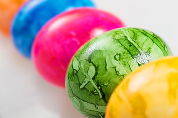 Fototapeta na wymiar easter colored eggs on white