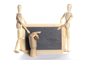 Gliederpuppen halten Schiefertafel