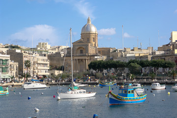 Fototapeta na wymiar Kalkara Creek i St Joseph Church, Malta
