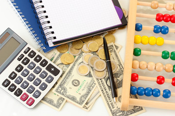 Bright wooden abacus and calculator. Conceptual photo of old