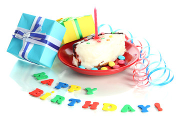 Colorful birthday cake with candle and gifts isolated on white