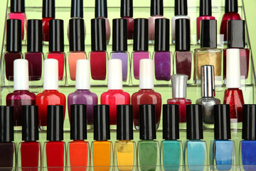 Bright nail polishes on shelf, close up