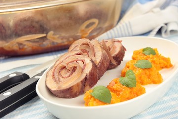 a portion of pork roulade with mashed carrot © SpaPartners