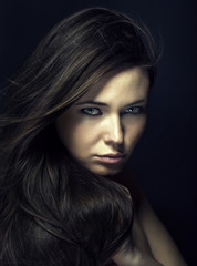 Portrait of a young woman with beautiful hair