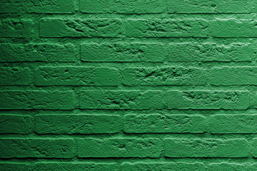 Naklejka premium Brick wall with a painting of a flag, Libya