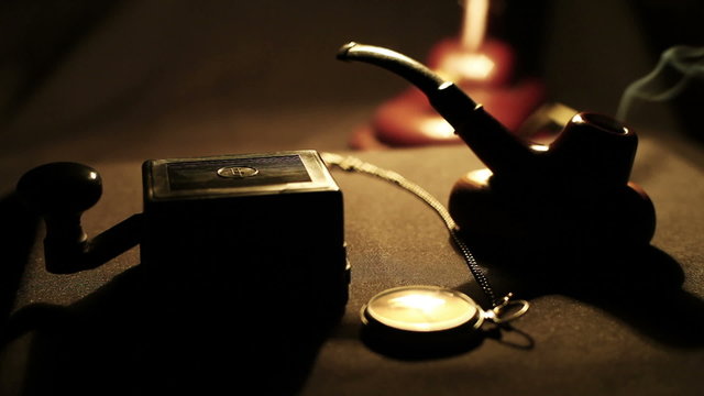 Smoking pipe, telegraph key,pocket watch and Lamp