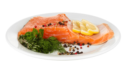 Fresh salmon fillet with herbals and lemon slices