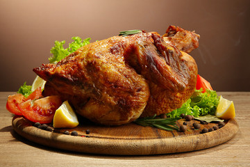 Whole roasted chicken with vegetables,