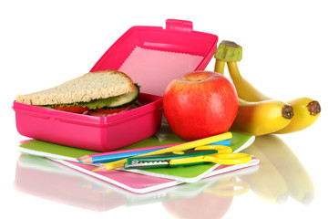 Lunch box with sandwich,fruit and stationery isolated on white