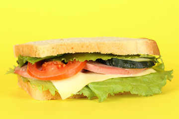 Sandwich on yellow background