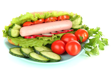 Tasty hot dog with vegetables isolated on white