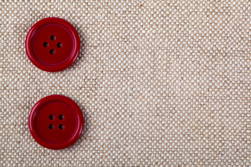 red buttons on the old clothes