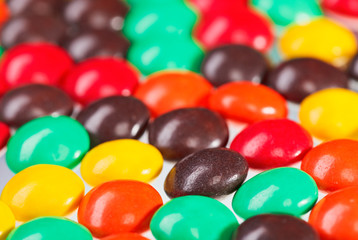 Fototapeta na wymiar Multicolor bonbon sweets (ball candies) food background, closeup