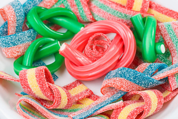 Multicolor gummy candy (licorice) sweets closeup food background
