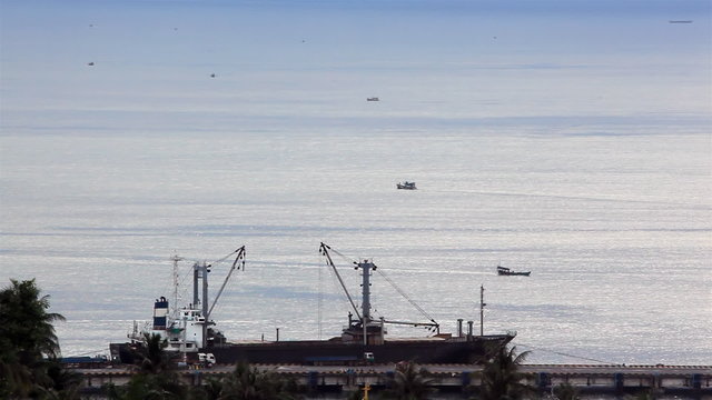 Ships floating in the High sea. Sihanoukville, Siam Gulf.