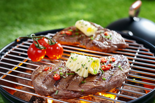 Succulent steak on a barbecue