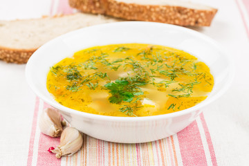 Pea soup with herbs and bread
