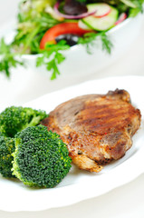 Grilled meat with salad