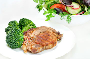 Grilled meat with salad