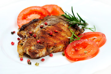 Grilled meat with tomatoes