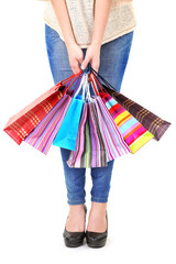 Woman with bags isolated on white