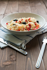 Rice with red capsicum and black olives