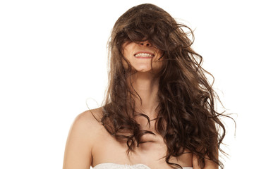 girl with scattered hair, showing just smile