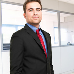 Fototapeta premium Confident businessman in his office