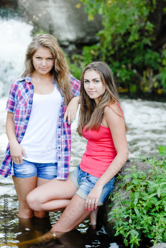 Two Teen Girls And Summer Outdoors Near Waterfall St