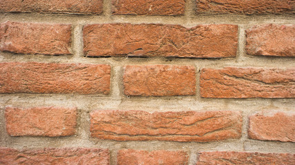 Background of red stone bricks wall texture