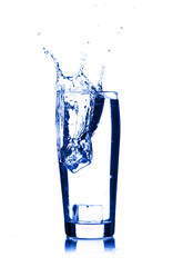 water splash in glass isolated on white background