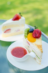 sweet cake with fruits on plate