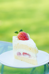 sweet cake with fruits on plate