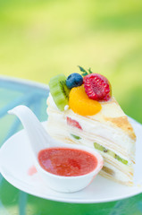 sweet cake with fruits on plate