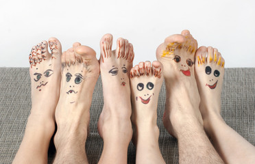 Family. Feet with smiling mugs © katrin_timoff