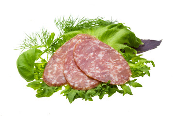 Sausages with salad and basil