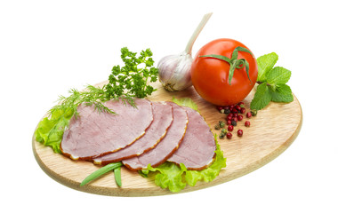 Ripe fresh ham with vegetables