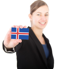 business woman holding a card with the Icelandic flag