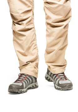 Hiker's legs in move at white background
