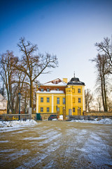 Fototapeta na wymiar Beautiful house in snowy scenery in polish village