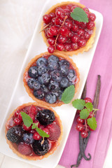 Fresh cakes with berries