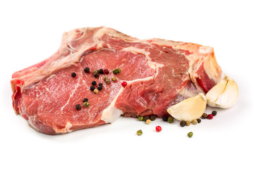 Raw beef with garlicon white background
